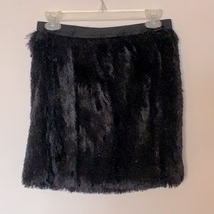 NWT fun faux fur mini skirt. Black, lined.